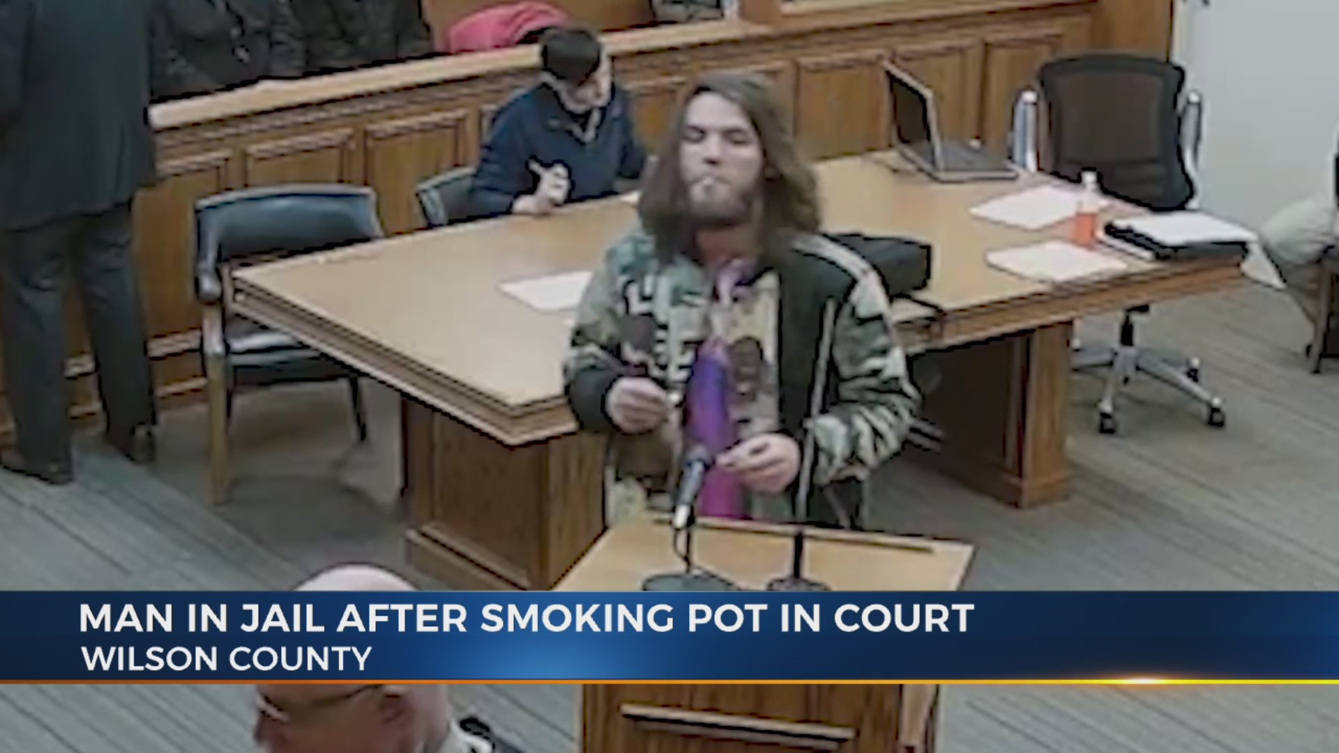 Thumbnail for the video titled "Tennessee man arrested for smoking marijuana in courtroom"