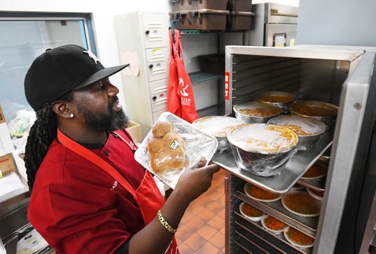 Chef Shaune Fairley gets a lunch of chili and sides for a class of 2 and 3 years at Starfish Family Services.