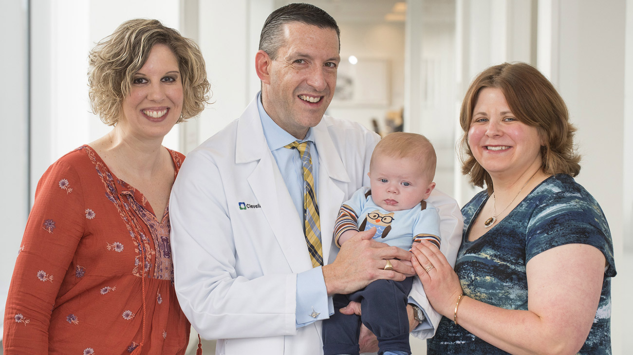 Melissa, Dr. Sekeres, Henry and Athena (left to right), after a follow-up appointment, at Cleveland Clinic Taussig Cancer Center.