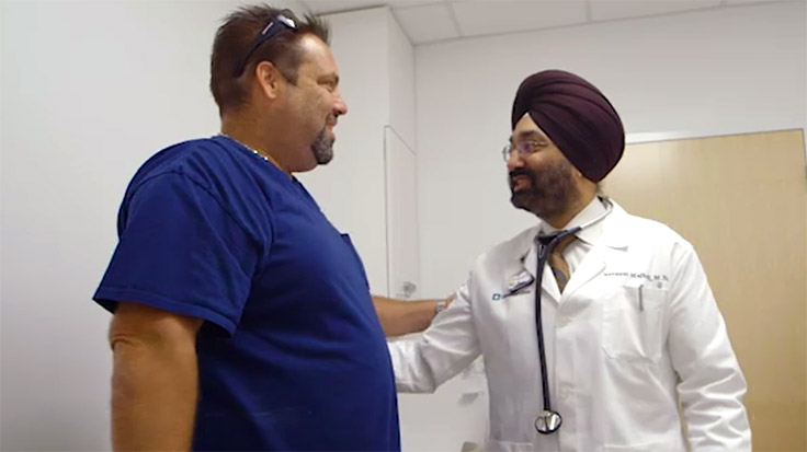 Jimmy Dunn and his doctor, Navneet Majhail, MD