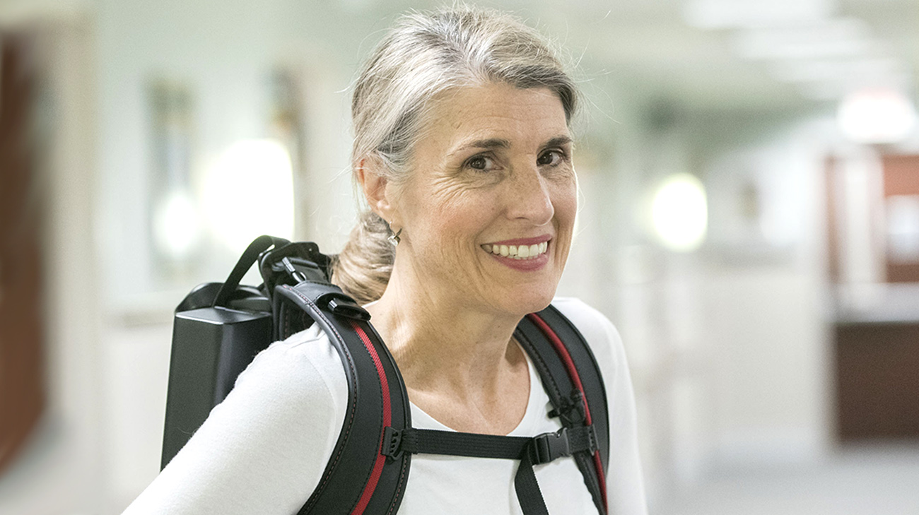 Kathy wears an exoskeleton during physical therapy. (Courtesy: Cleveland Clinic)