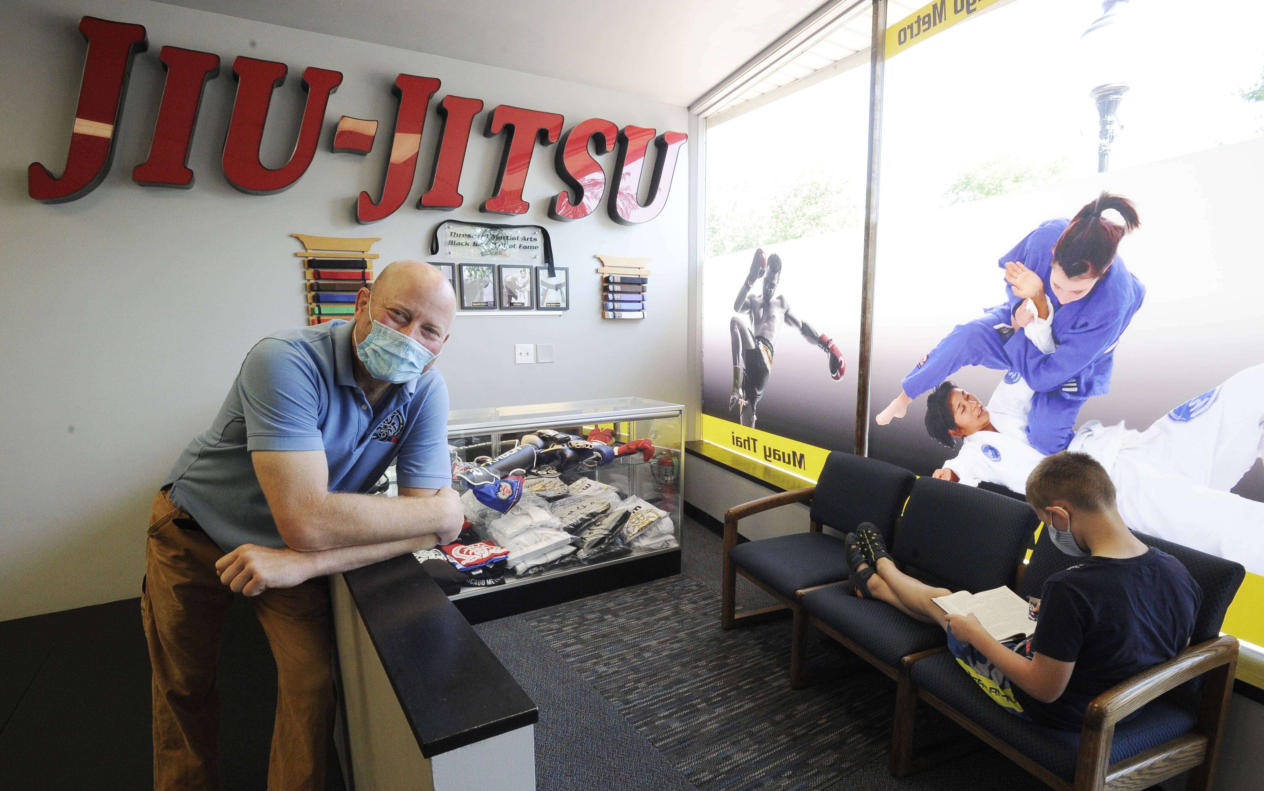 Bill Shimuk has set up e-learning pods within his Threshold Martial Arts studio in downtown Mount Prospect. He and other parents got the idea when area school districts announced plans to start their academic years remotely.