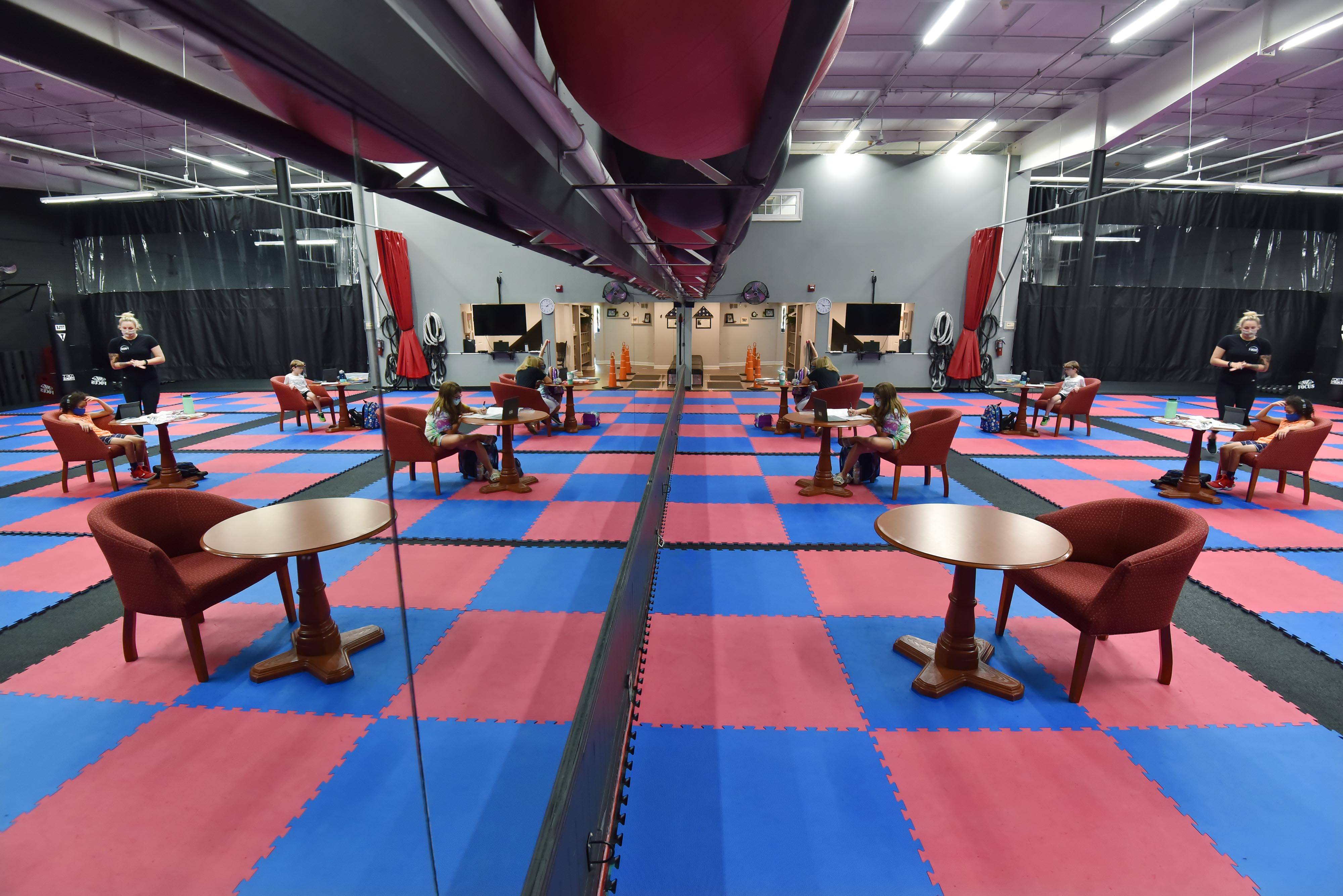 Host to martial arts and self-defense classes by night and now a learning center by day, Focus Martial Arts & Fitness in Lake in the Hills has room for up to two dozen desk pods for students taking virtual classes.