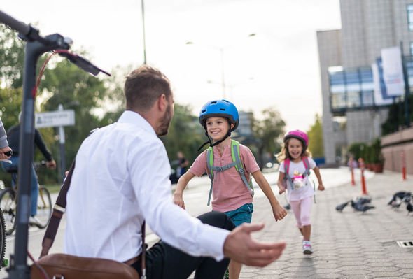 Man happy to pick up daughter and son from school