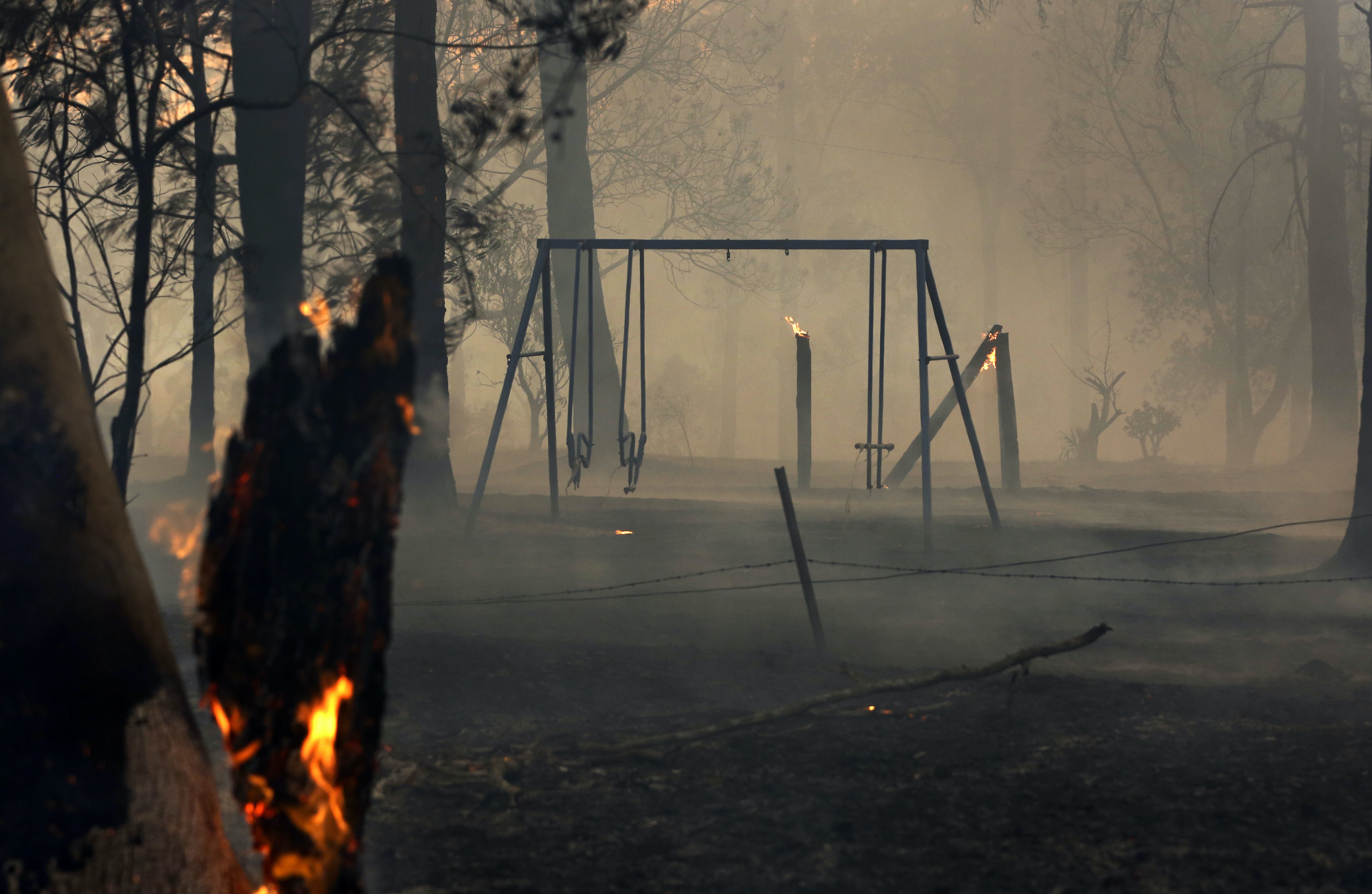 A burnt playground in smoke.